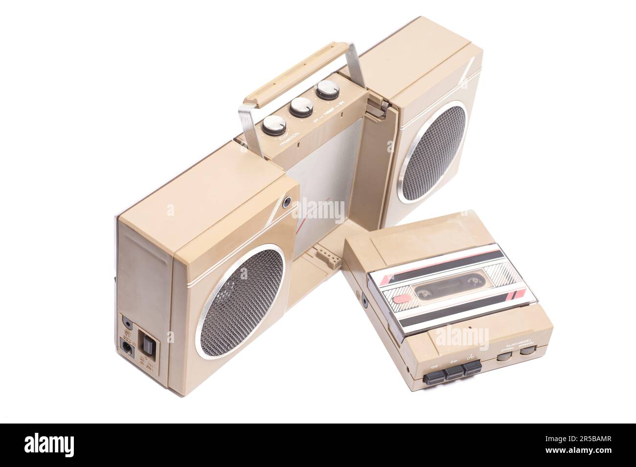 Retro portable stereo cassette player from 80s. English translation: volume, timbre (inscription in Russian). Stock Photo