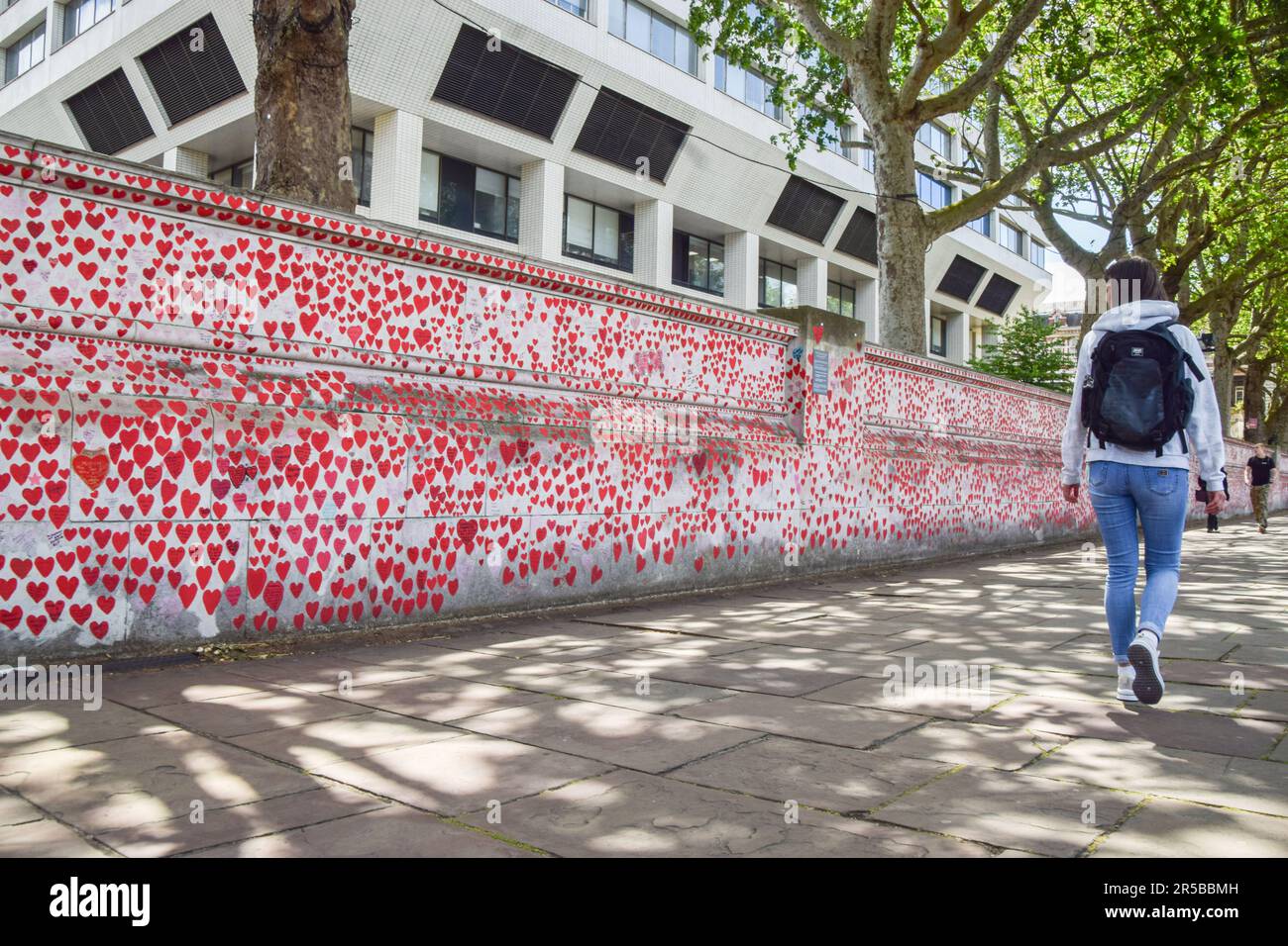 London, UK. 2nd June 2023. A woman walks past the National Covid Memorial Wall as the UK government launches a high court challenge to try and prevent the handing over of Boris Johnson’s unredacted WhatsApp messages to the public inquiry into the handling of the coronavirus pandemic. Credit: Vuk Valcic/Alamy Live News Stock Photo
