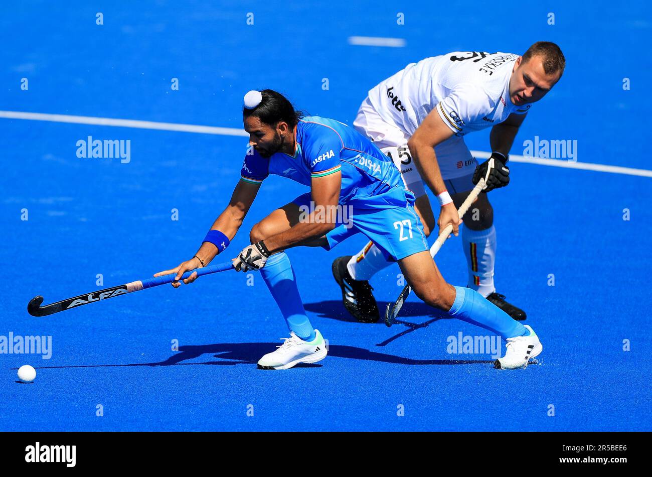 India's Akashdeep Singh gets past Belgium's Emmanuel Stockbroekx during the FIH Hockey Pro League match at Lee Valley, London. Picture date: Friday June 2, 2023. Stock Photo