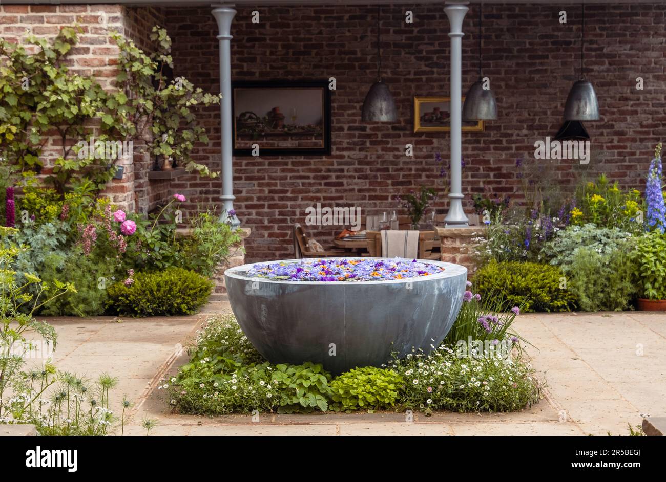 The Savills Garden designed by Mark Gregory at the Chelsea Flower Show 2023 in London, UK. Stock Photo