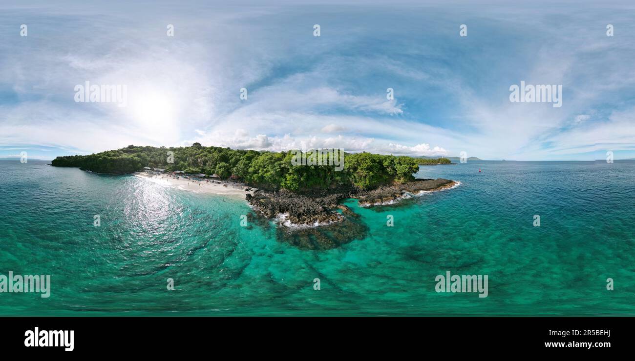 A scenic aerial view of a tropical island with a pristine white sand ...