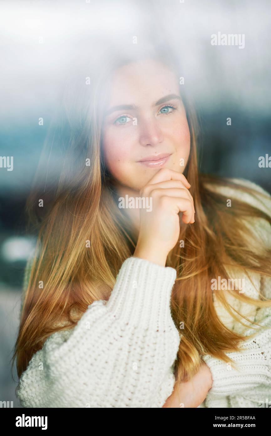 Beauty portrait of young pretty 20 year old female model, girl looking