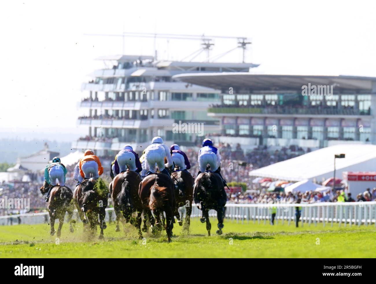 Runners and riders in action as they compete in the Nyetimber Surrey Stakes during ladies day of
