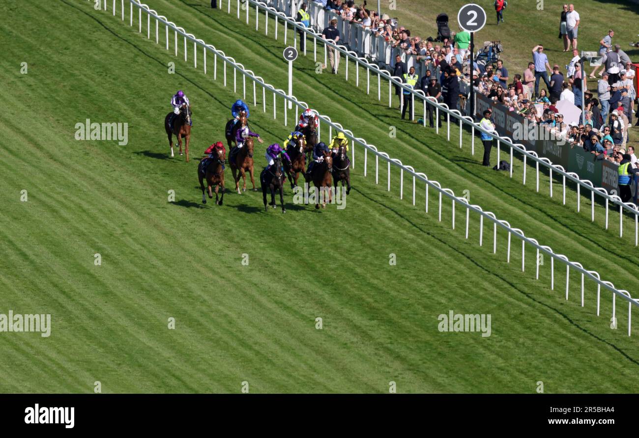 Runners and riders in action during The Betfred Oaks during ladies day