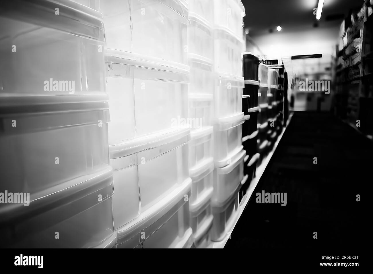 Rows of stacked plastic containers for organization and storage Stock Photo Alamy