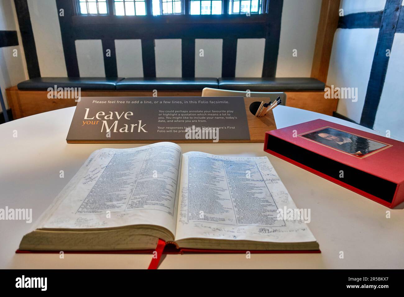 New Place and Nash's House interior with book encouraging visitors to comment on William Shakespeare's first folio. Stratford upon Avon, England UK Stock Photo