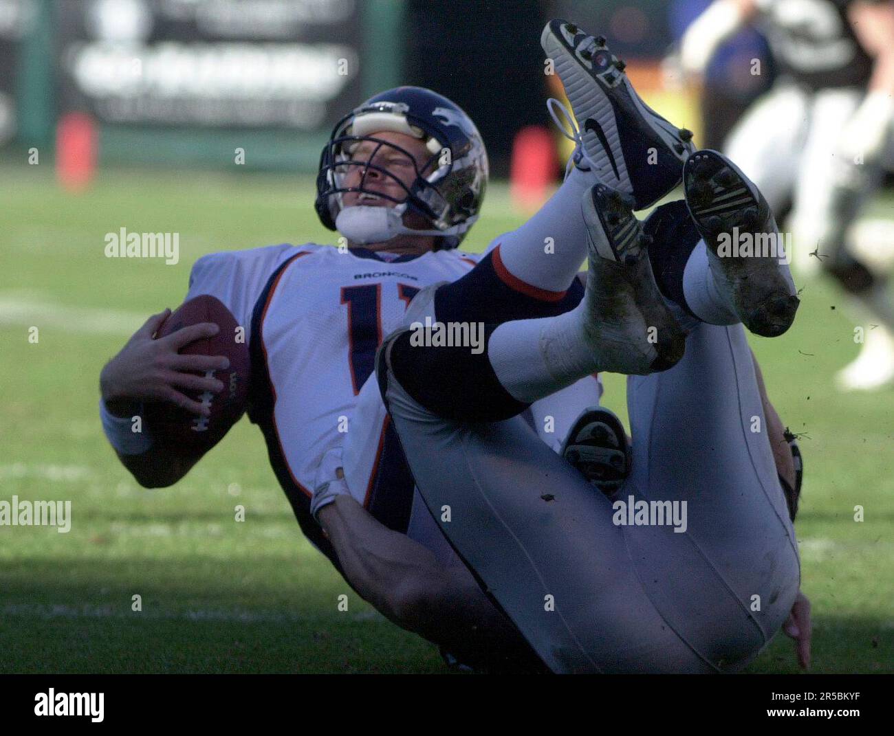 Denver Broncos vs. Las Vegas Raiders. NFL Game. American Football League  match. Silhouette of professional player celebrate touch down. Screen in  back Stock Photo - Alamy