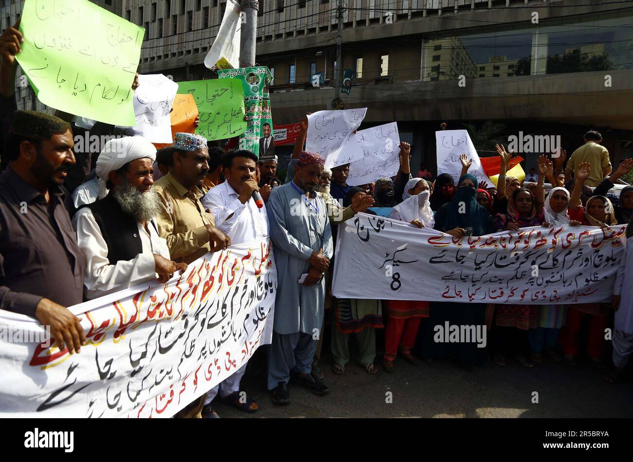 Residents of Saif Al Marri Goth are holding protest demonstration against high handedness of influent people, at Karachi press club on Friday, June 2, 2023. Stock Photo