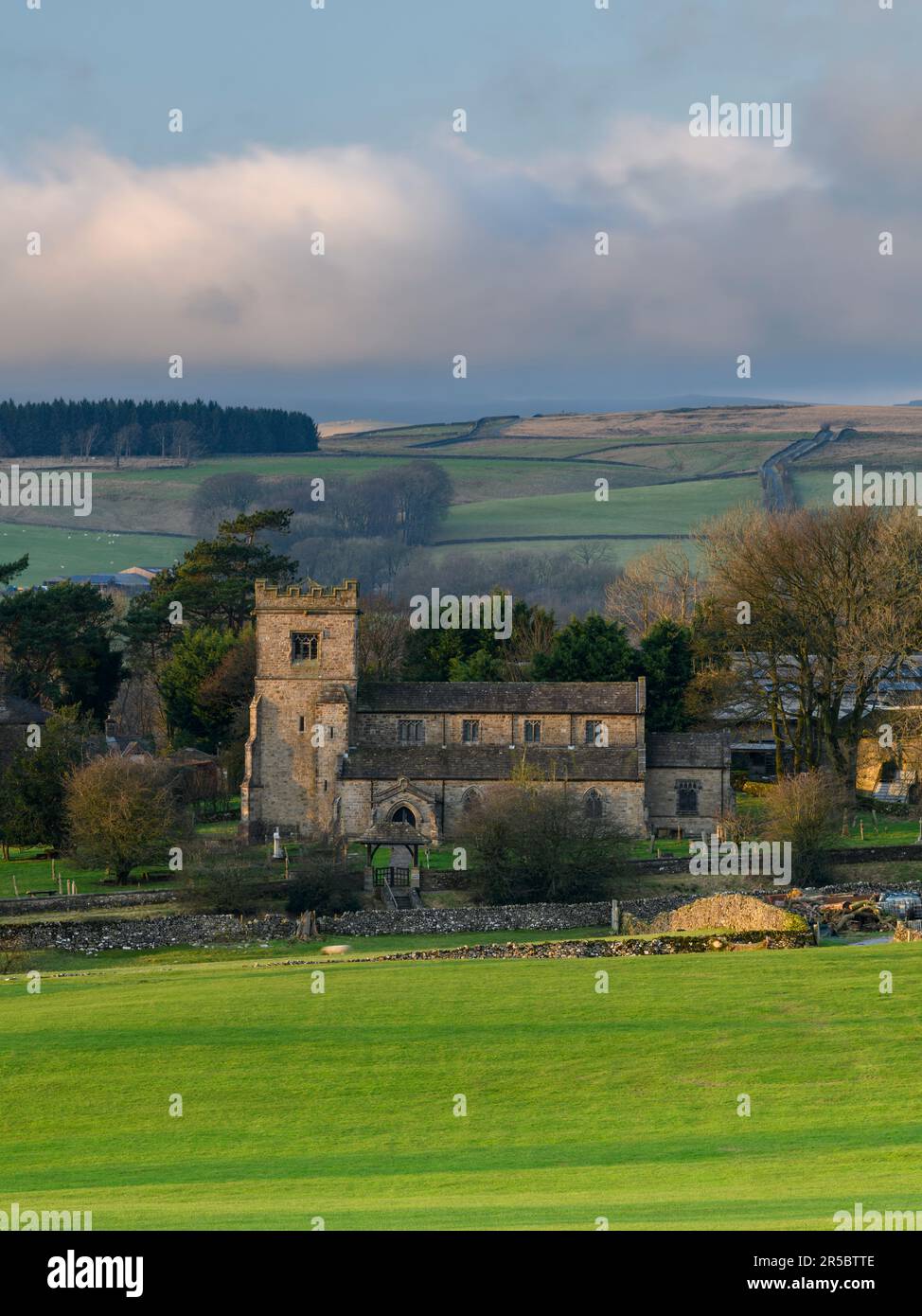 Beautiful old stone church view (rural Dales village, evening light