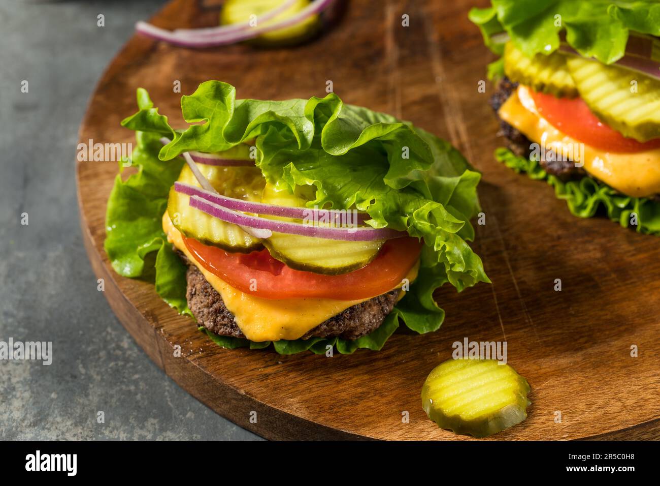 Gluten Free Paleo Bunless Cheeseburger with Lettuce and Tomato Stock