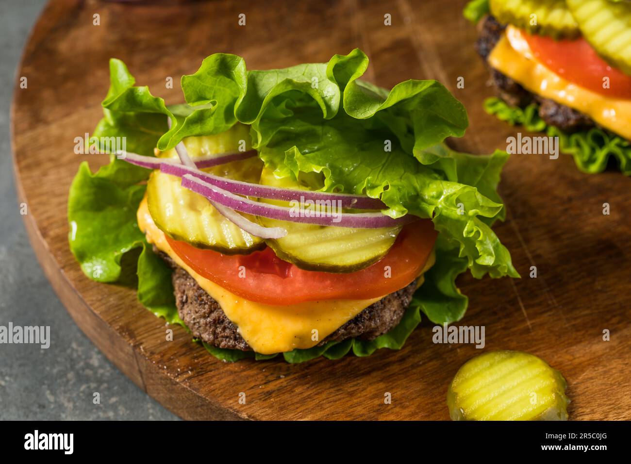 Gluten Free Paleo Bunless Cheeseburger with Lettuce and Tomato Stock
