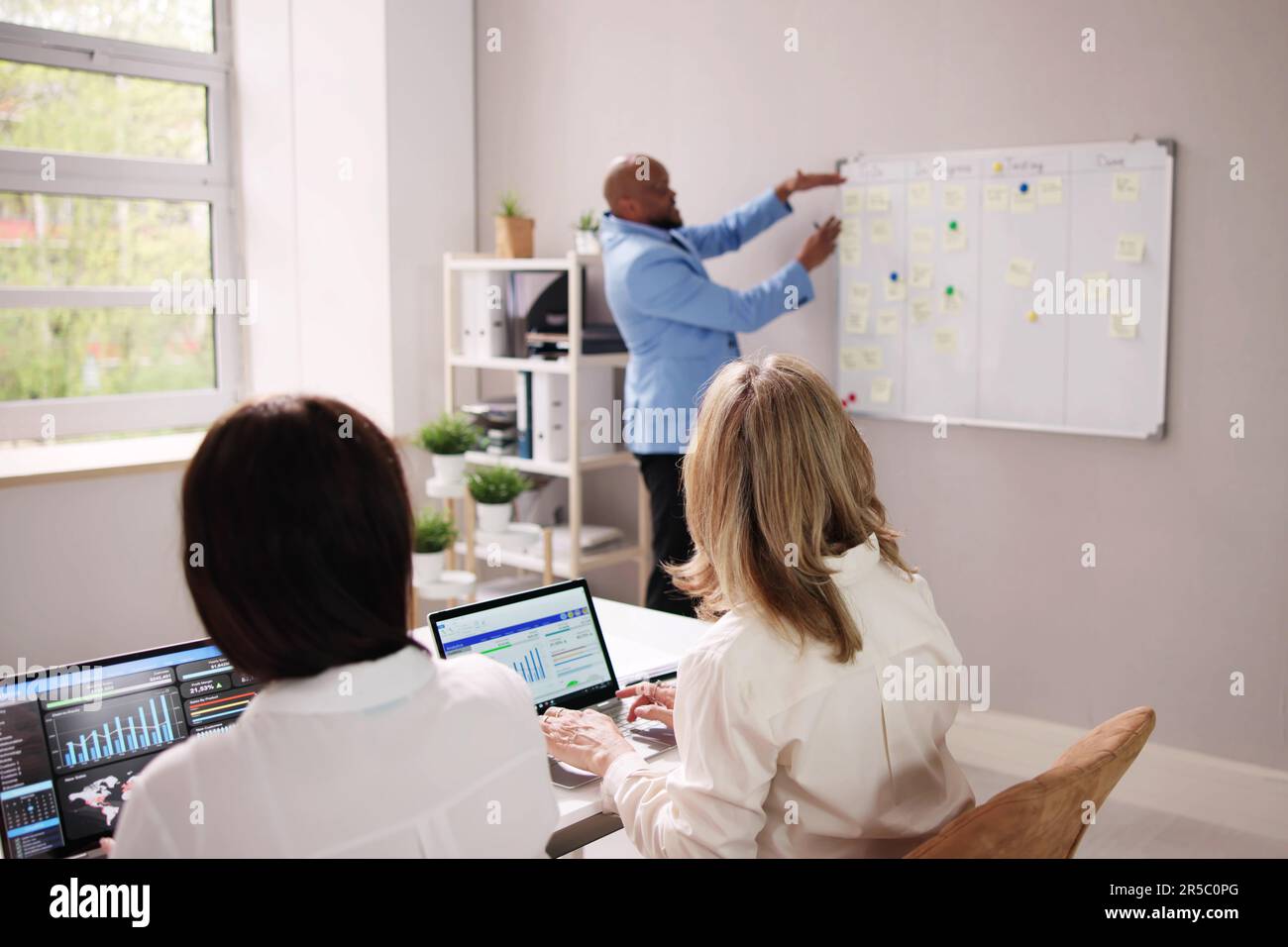 Agile Business Team Using Kanban Task Board Stock Photo