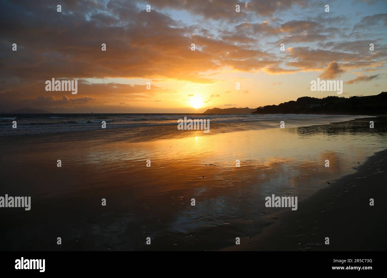 Waipu Beach sunrise - New Zealand Stock Photo