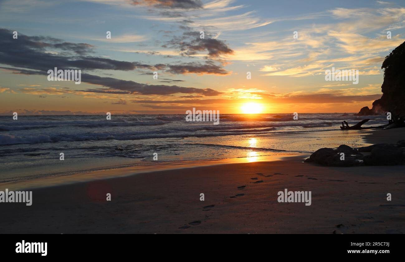 Sunrise sky over Waihi Beach - New Zealand Stock Photo
