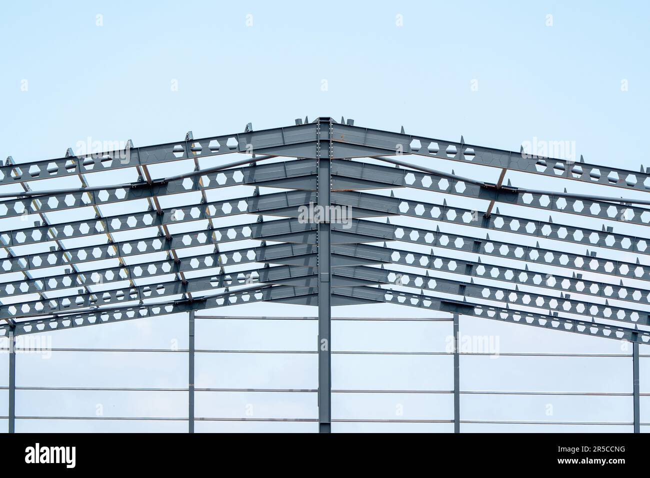 Building construction with steel construction, steel roof. Stock Photo