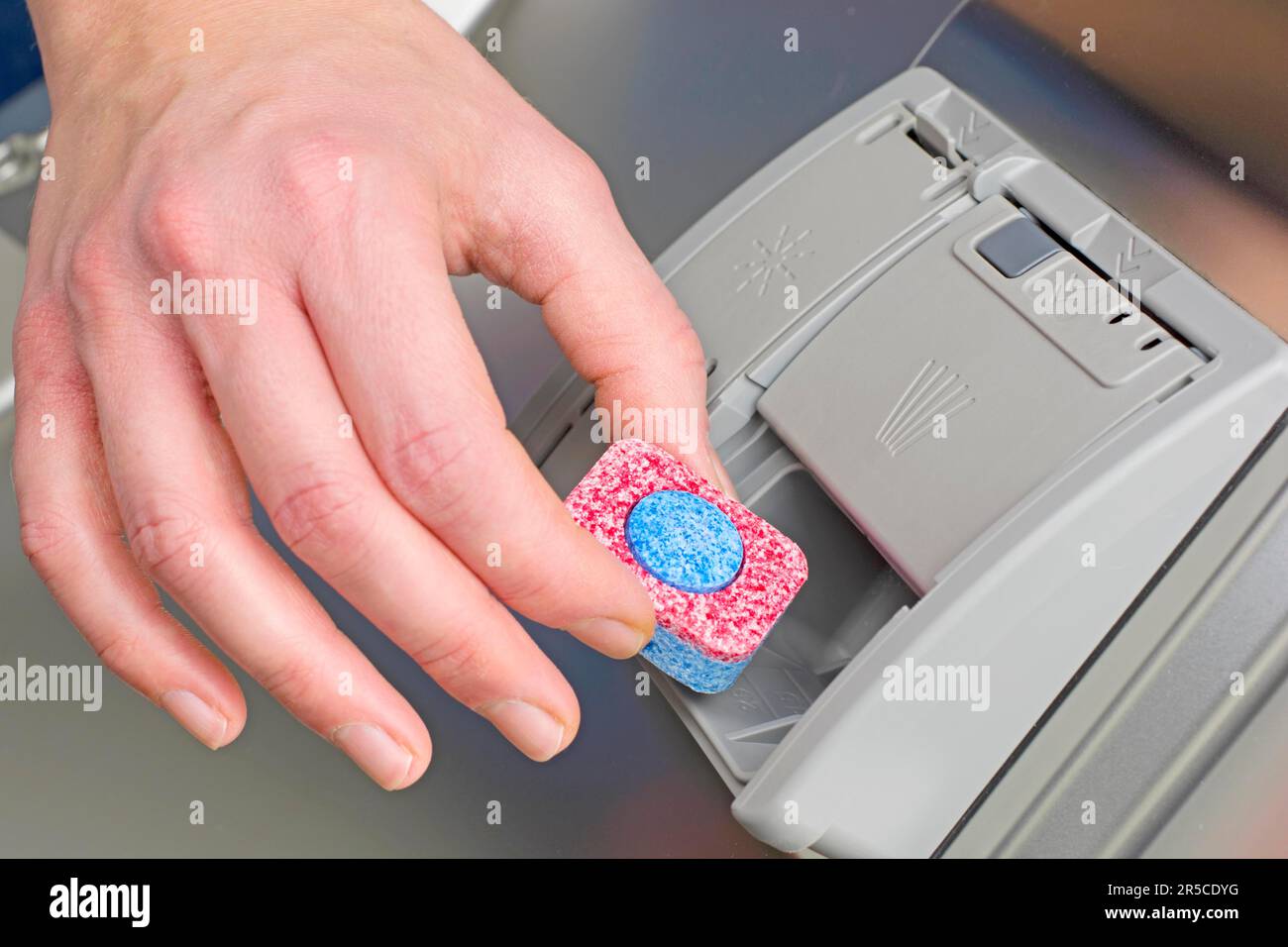 Dishwasher, hand and tab Stock Photo Alamy