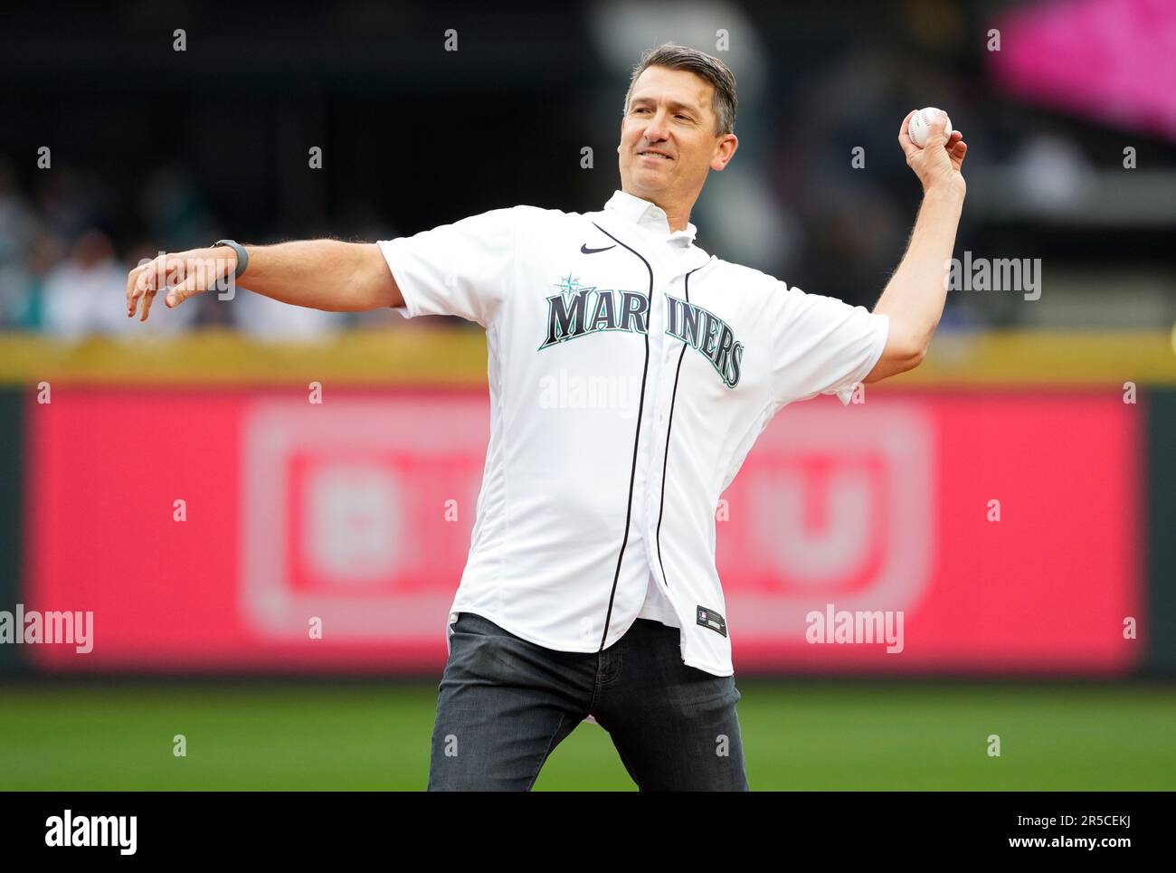Former Seattle Mariners first baseman John Olerud throws out the ceremonial  first pitch during a baseball game Wednesday, May 31, 2023, in Seattle. (AP  Photo/Lindsey Wasson Stock Photo - Alamy