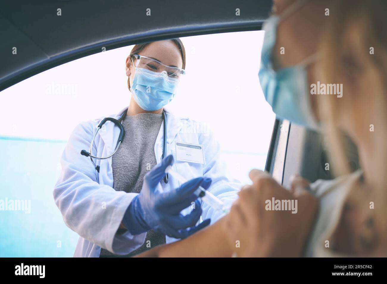What the world needs is a good dose of safety. a masked young doctor ...