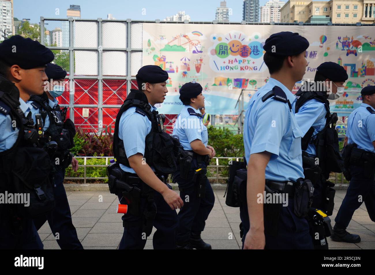 Police officers patrol around the park with gear. The upcoming Sunday ...