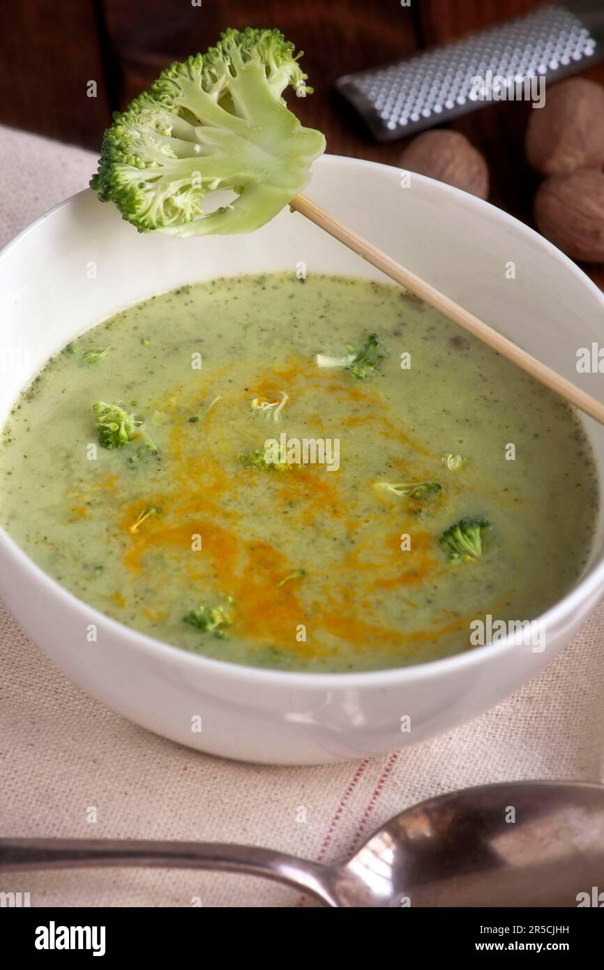 Broccoli soup with creme fraiche and turmeric Stock Photo