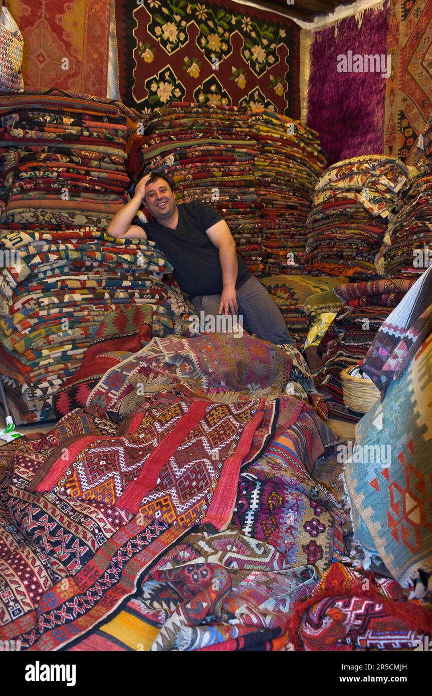 Carpet seller in Fethiye, Turkish Aegean, Aegean, Turkey Stock Photo
