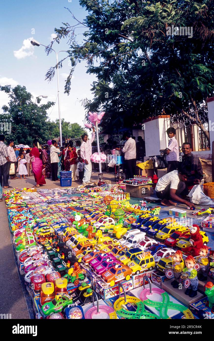 A man selling plastic toys near V.O.C park, Coimbatore, Tamil Nadu