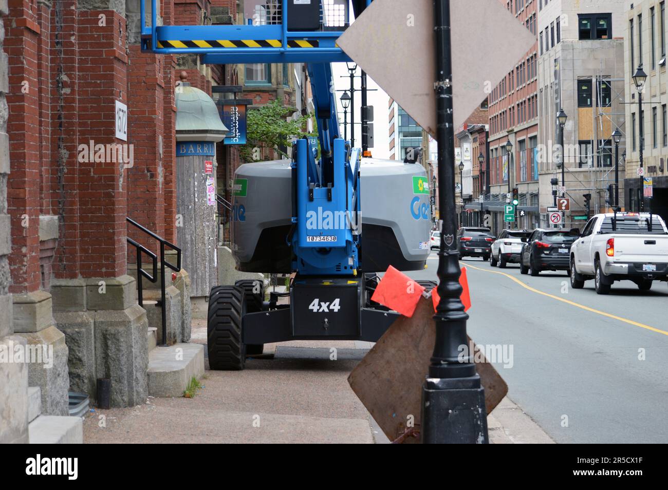 Aerial work platform obstructing the sidewalk on Barrington Street in downtown Halifax, Canada, in front of the former NFB building. Stock Photo