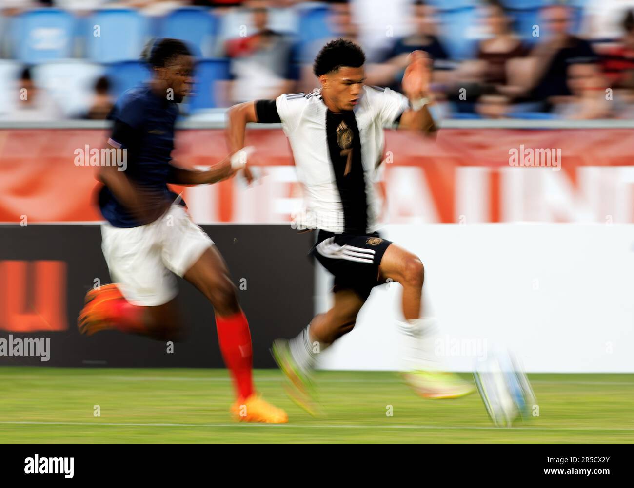 Budapest, Hungary. 2nd June, 2023. Paris Brunner of Germany competes for the ball with Yvann Titi of France during the UEFA European Under-17 Championship 2023 Final match between Germany and France at Hidegkuti Nandor Stadium on June 2, 2023 in Budapest, Hungary. Credit: Laszlo Szirtesi/Alamy Live News Stock Photo