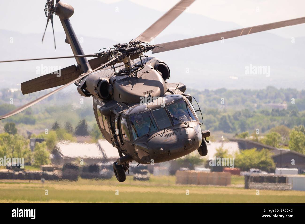 A UH-60 Black Hawk prepares to land on Fort William Henry Harrison, Mont., May 30, 2023. The Black Hawk is the U.S. Army&#39;s utility tactical transport helicopter. It provides air assault, general support, aeromedical evacuation, command and control, and special operations support to combat, stability and support operations. (U.S. Air Force photo by Airman 1st Class Mary Bowers) Stock Photo