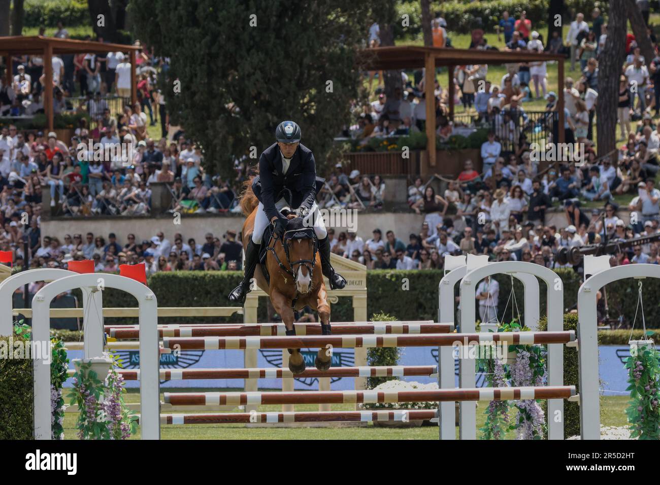 Rome, Italy - 28th May, 2023: ROME ROLEX GRAND PRIX 2023 INTERNATIONAL, Equestrian jumping, Piazza di Siena. First round, horse rider Andre Thieme (GER) in action on playground during competition. Stock Photo