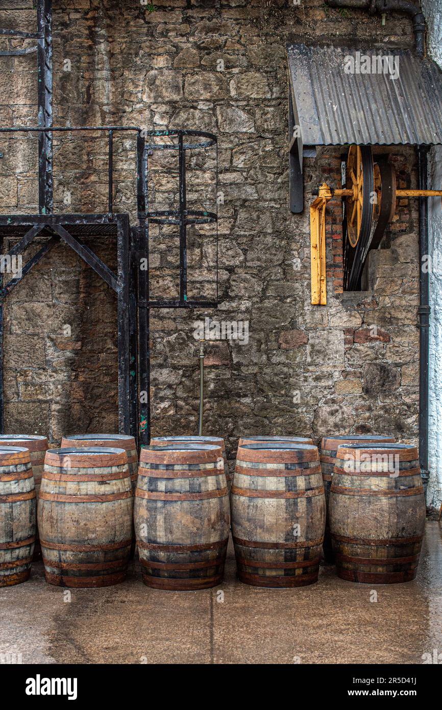 Exterior of Springbank Distillery with whisky barrels , Campbeltown