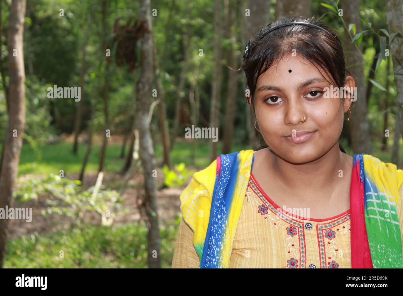 Close up of a beautiful teenage Indian Odia girl wearing colorful Dress ...