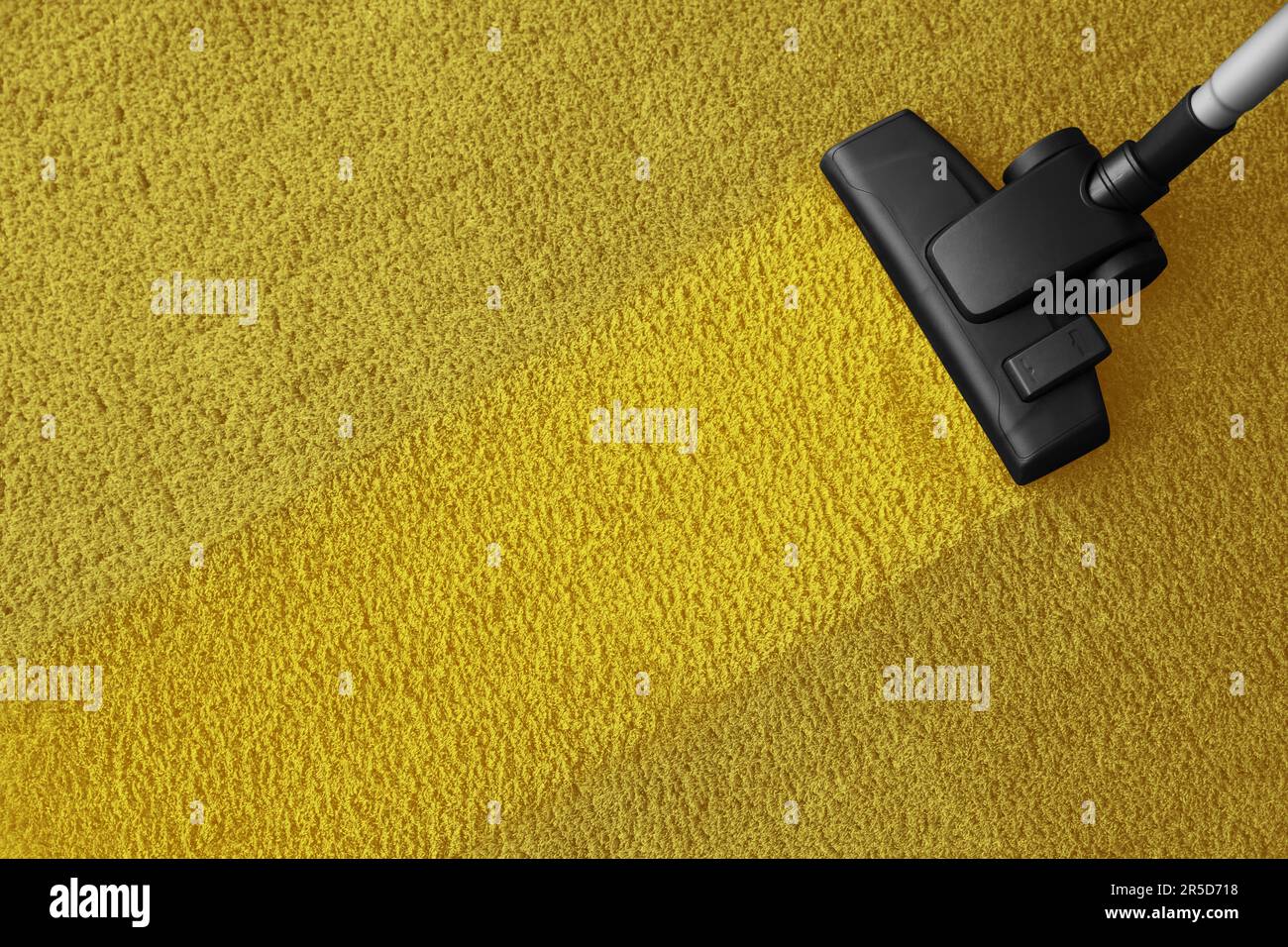 Vacuuming carpet. Clean area after using device, top view Stock Photo