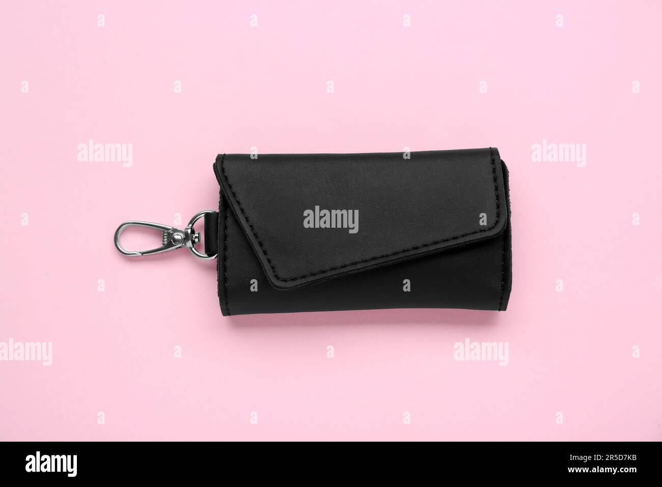 Stylish leather keys holder on pink background, top view Stock Photo ...
