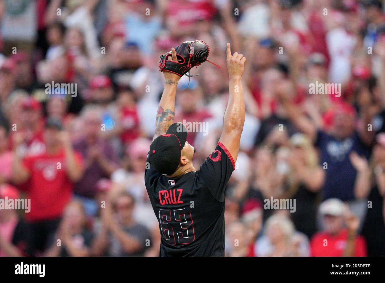 Cincinnati Reds relief pitcher Fernando Cruz reacts after the top of