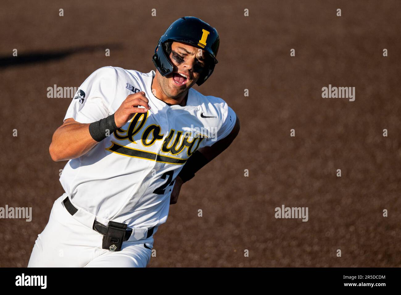 Iowa infielder Brennen Dorighi (24) rounds third base during an NCAA