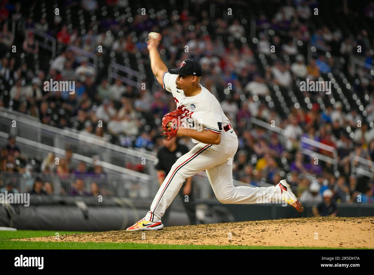 Minnesota Twins pitcher Jhoan Duran throws against the Cleveland