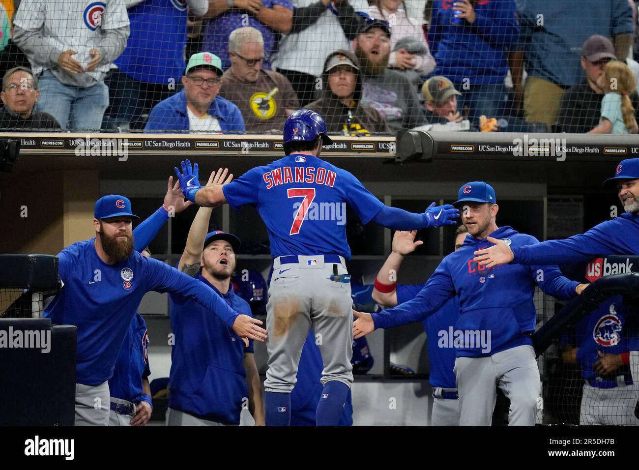 From left to right, Chicago Cubs' Nick Madrigal, Dansby Swanson (7