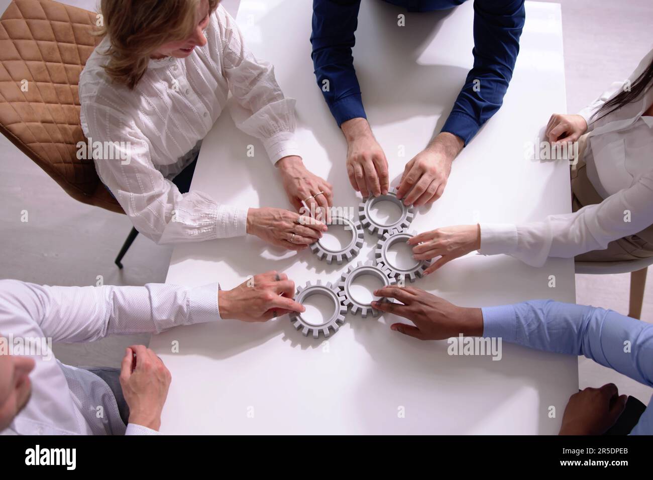 Diverse People Hands Holding Gear Wheels. Business Partnership Stock ...