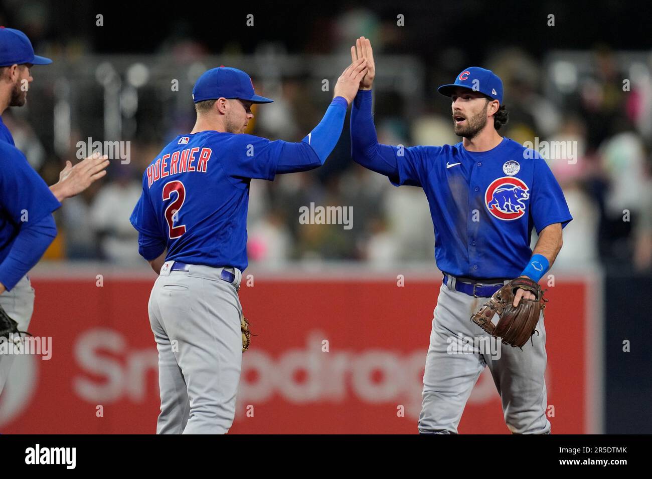 Chicago Cubs shortstop Dansby Swanson, right, celebrates with teammate