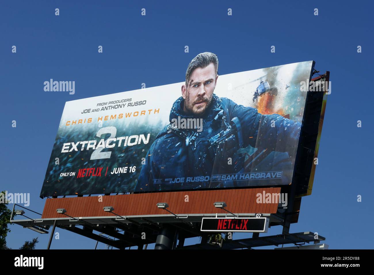 Los Angeles, California, USA 2nd June 2023 Helicopter on Chris Hemsworth Extraction 2 Netflix Billboard on Sunset Blvd on June 2, 2023 in Los Angeles, California, USA. Photo by Barry King/Alamy Stock Photo Stock Photo