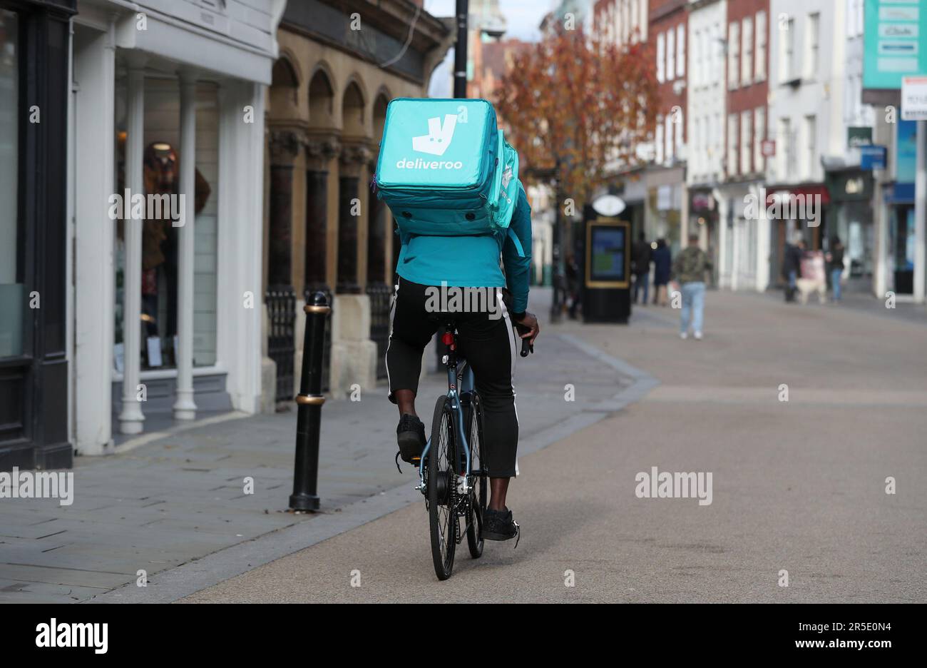 File photo dated 05/11/20 of a Deliveroo rider. Ordering supermarket groceries via a delivery app such as Deliveroo, Just Eat or Uber Eats could cost twice the price of buying directly from the same store, according to Which? Meanwhile, Amazon is charging up to 45% more for Morrisons products than if they were bought from the supermarket's own website, the consumer group found. Issue date: Saturday June 3, 2023. Stock Photo