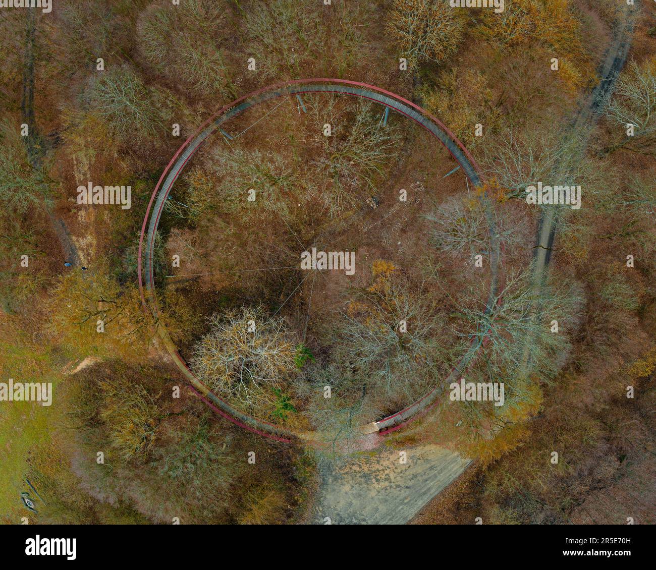 Tis round shaped canopy trail is on the Gerecse mountains in North Hungary. The path is visible good from the air in winter time. Stock Photo