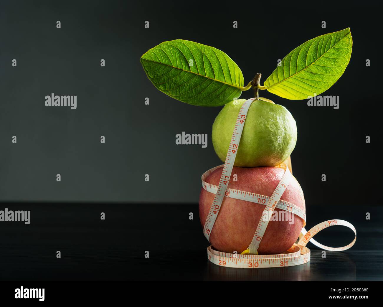 Guava with apple fruit that have tape line wrap around that like a