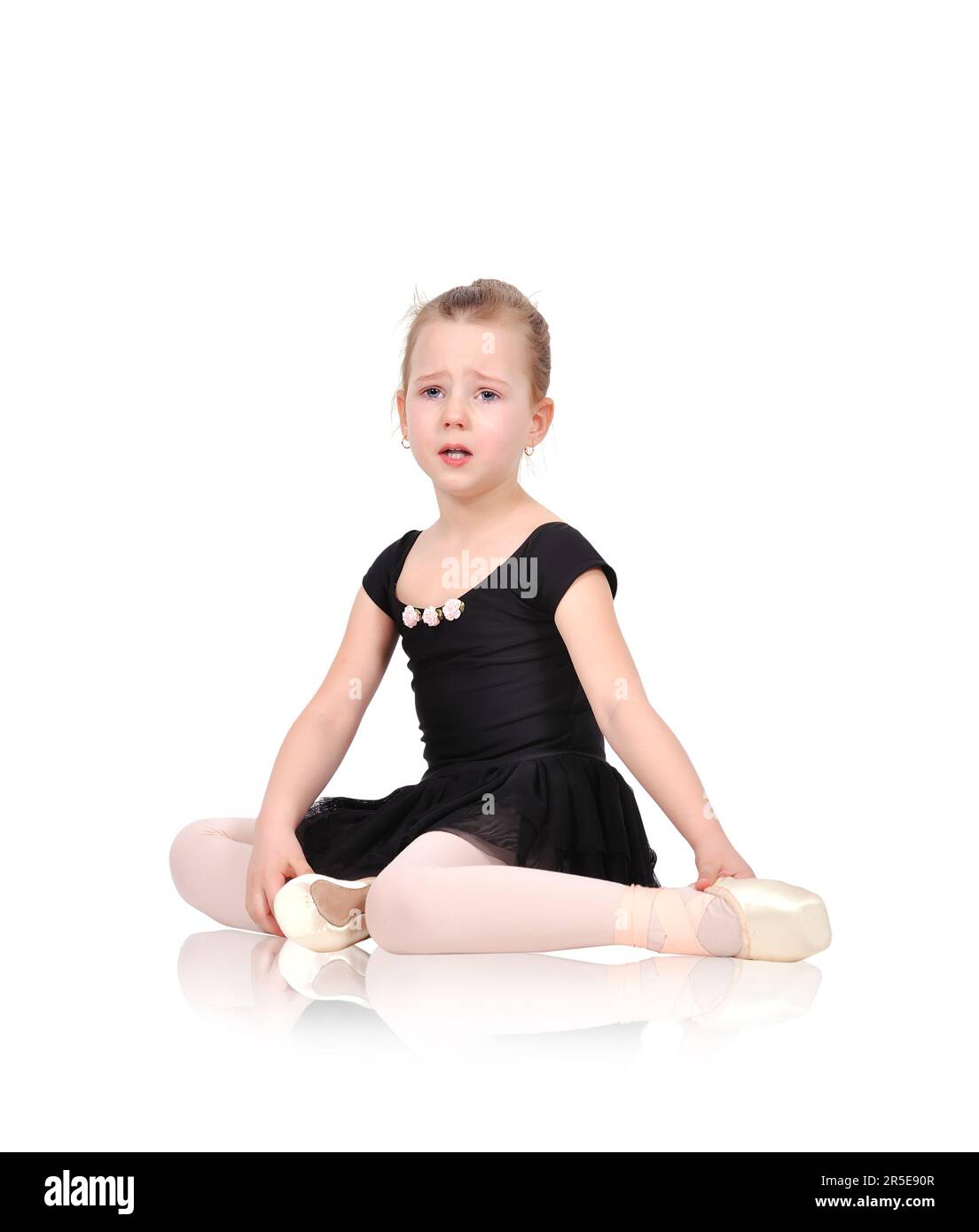 little ballerina crying from exhaustion Stock Photo