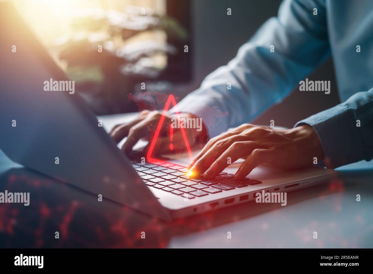 System hacked warning alert on notebook (Laptop). Cyber attack on computer network, Virus, Spyware, Malware or Malicious software. Cyber security and Stock Photo