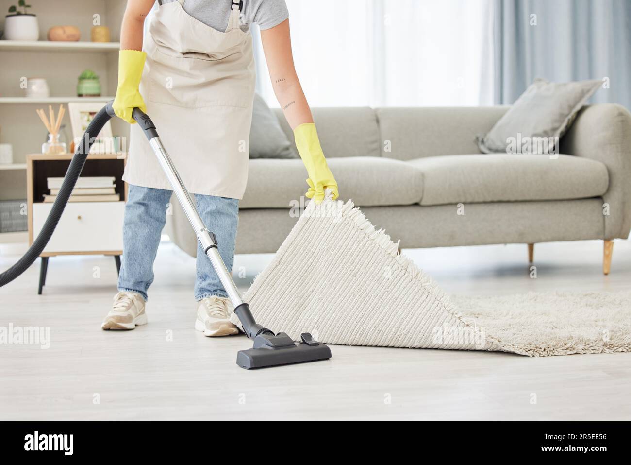 Carpet, person and vacuum with cleaner, home and remove dust for