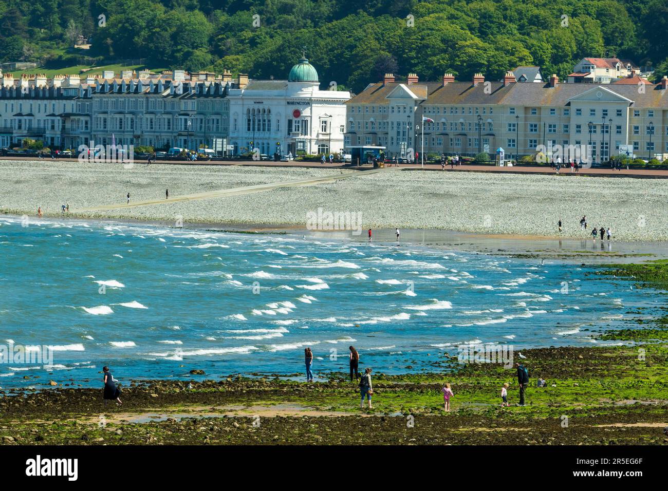 Llandudn north shore beach on a windy dat with waves rolling in. Stock Photo
