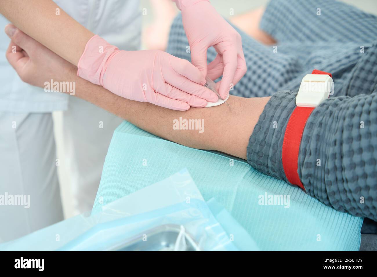 Medical Protection Hand Young man takes protective medical hi-res stock photography and images ...