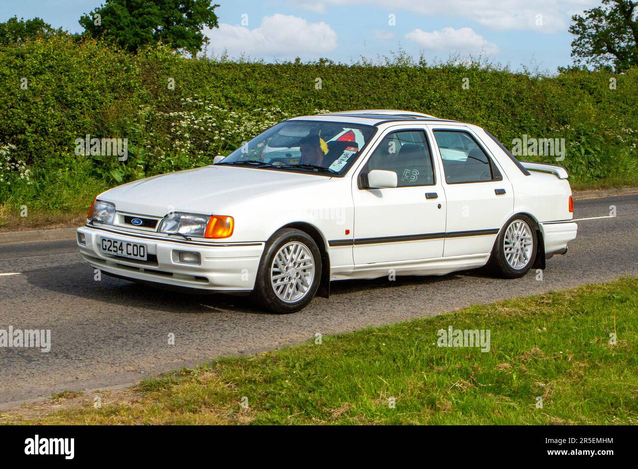 1990 90s, nineties Ford Sierra Rs Cosworth White Car Saloon Petrol 1993cc classic vintage car, Congleton, UK Stock Photo